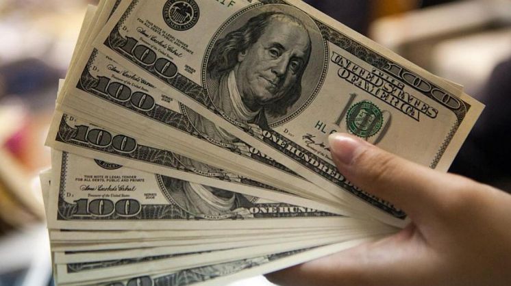 Economistas prevén un dólar de $24 para fin de año